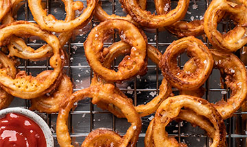 How can you cook frozen onion rings in an air fryer
